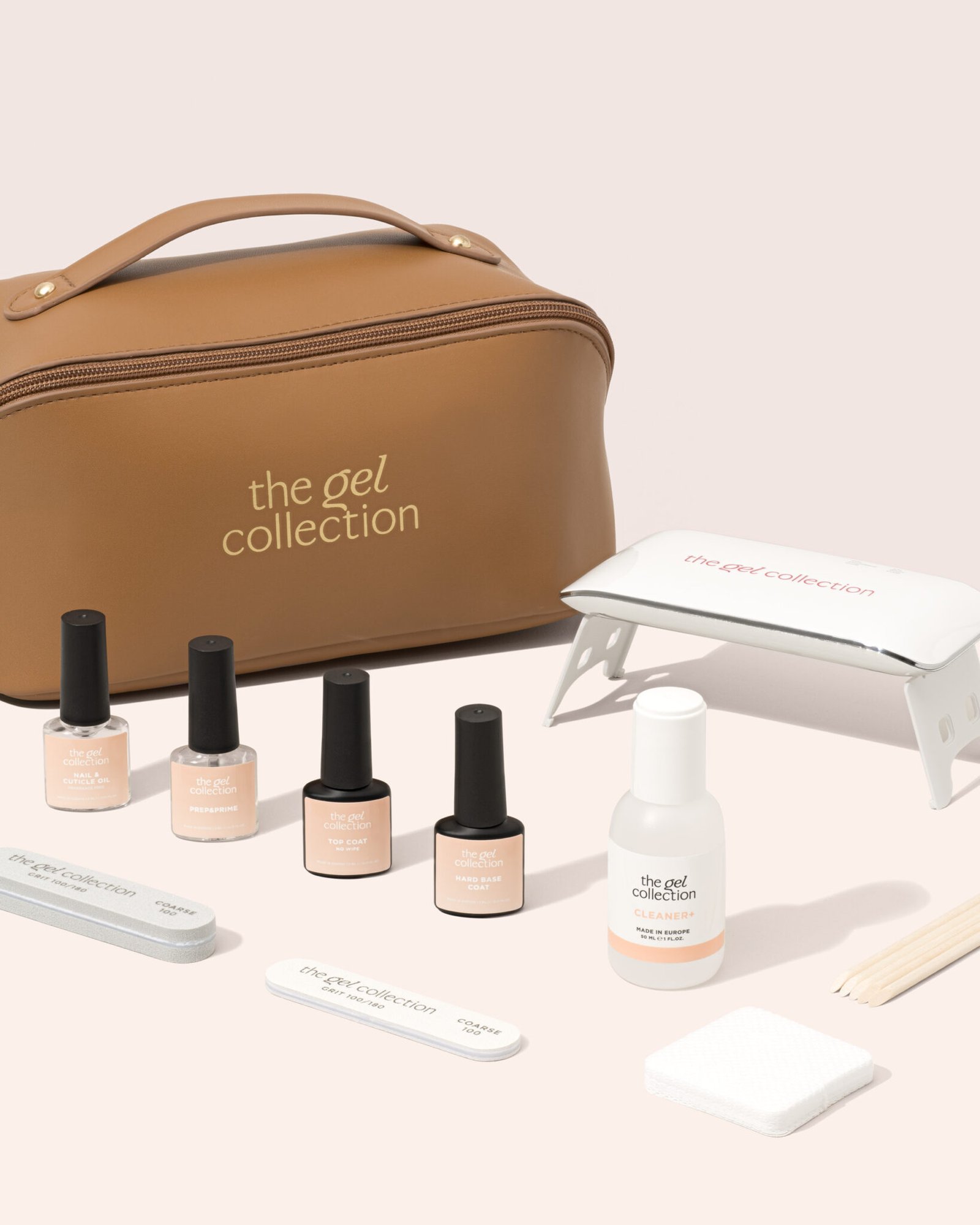 Nail products travel kit with a bag. Nail product photography for webshop and ecommerce by product photographer Sanna Lange.